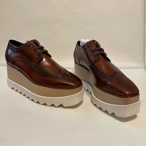 Stella McCartney brown leather lace up wedge loafer